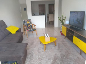 Quarto aconchegante em Apê, no Calçadão